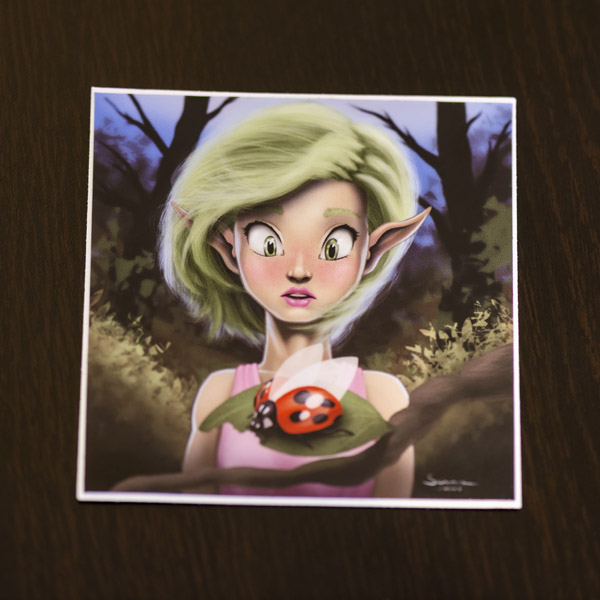 Photograph of the elven woman and lady bug sticker available in the Copious Ink Etsy store.