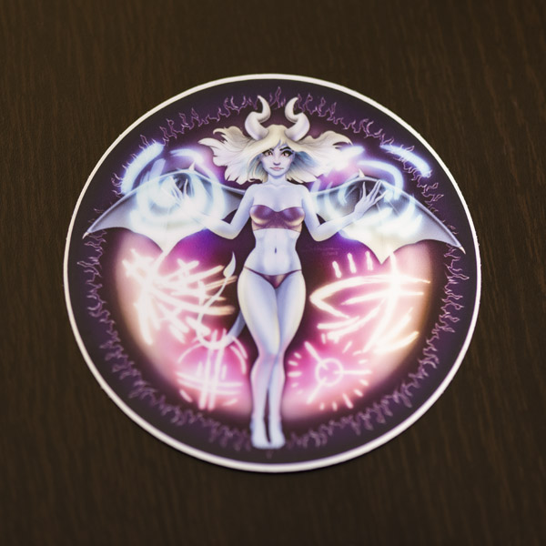 Photograph of the succubus sticker (matte) available in the Copious Ink Etsy store.