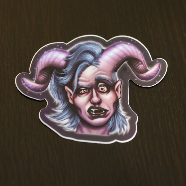 Photograph of the teifling woman sticker available in the Copious Ink Etsy store.